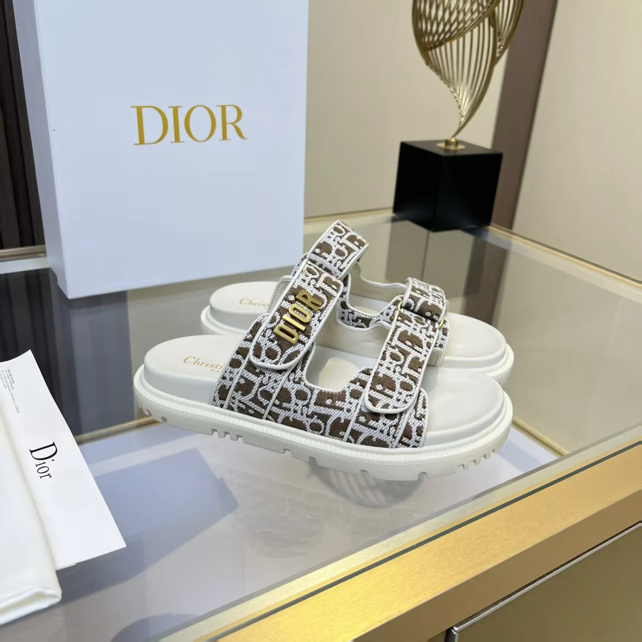 👟👟Ex-factory price 480👟👟 Dior classic popular sandals Step into the fashion territory of Dior slippers and encounter the ultimate fusion of elegance and comfort. The upper is engraved with the Christian Dior Paris logo using exquisite embroidery technology. The delicate stitching tells the brand's profound heritage and is fully recognizable.   Made of high-quality materials, it feels soft and fits your feet, as if it is a gentle care tailor-made for your feet. The sole is carefully designed and engraved with Christian Dior's lucky star symbol. It is not only a beautiful embellishment, but also provides reliable grip, making every step steady and secure.   It has a simple design and is easy to put on and take off. Whether it is a lazy weekend or a pleasant vacation, it can be easily adapted. Whether paired with casual shorts, casual jeans, or an elegant dress, Dior slippers can instantly enhance the overall style and show a casual fashion attitude.   Dior slippers, in the name of fashion, inject luxurious charm into your life and accompany you with every step you take with confidence and elegance. Material: Fine genuine cowhide upper, outsole, TPR, non-slip and wear-resistant, code number: 35-41 (42 customized)